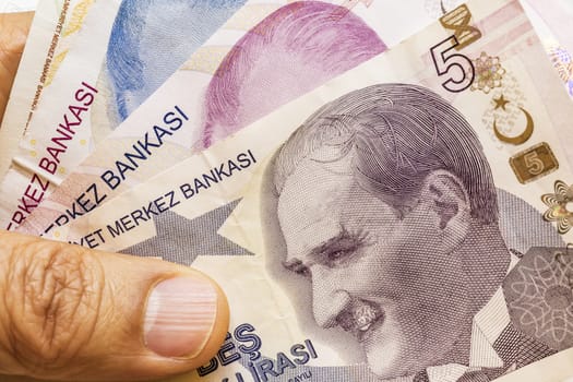 close up turkish lira banknotes on background