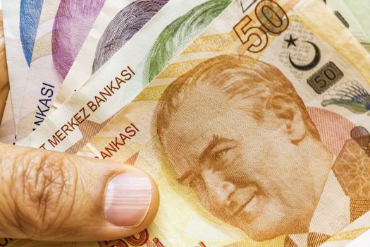 close up turkish lira banknotes on background