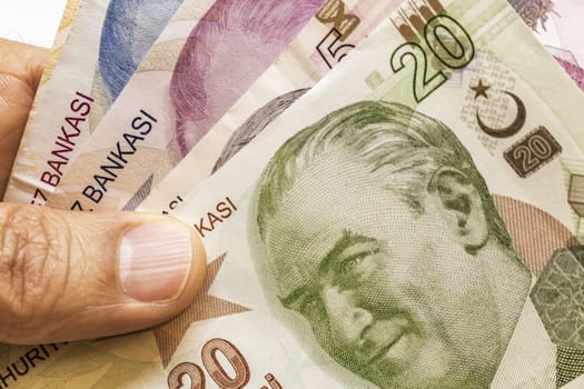 close up turkish lira banknotes on background