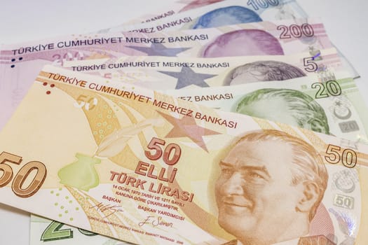 close up turkish lira banknotes on background