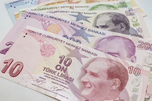 close up turkish lira banknotes on background