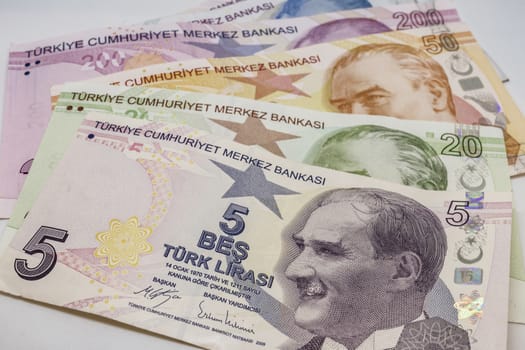 close up turkish lira banknotes on background