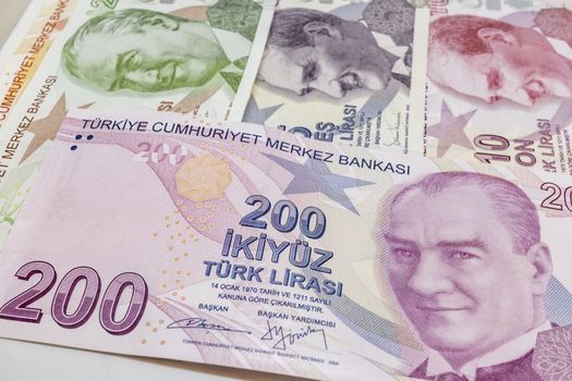 close up turkish lira banknotes on background
