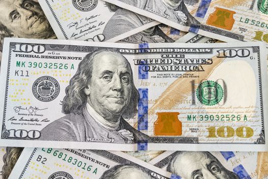 close up US dollar banknotes on background.