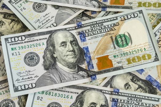 close up US dollar banknotes on background.
