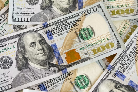 close up US dollar banknotes on background.