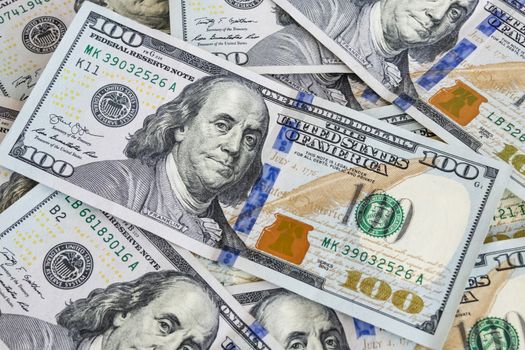 close up US dollar banknotes on background.
