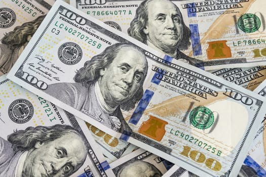 close up US dollar banknotes on background.