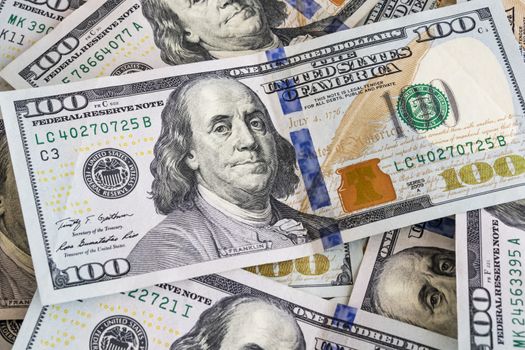 close up US dollar banknotes on background.