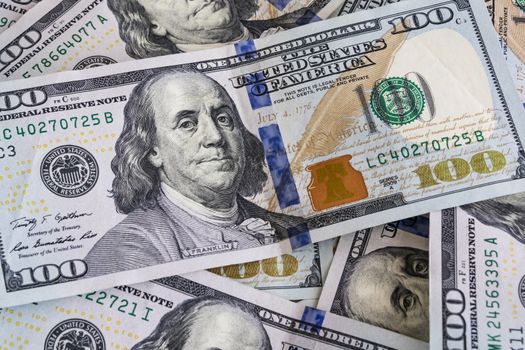 close up US dollar banknotes on background.