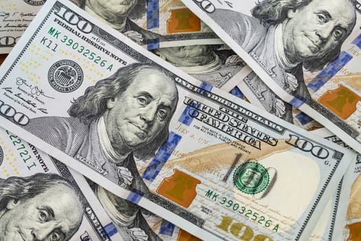 close up US dollar banknotes on background.