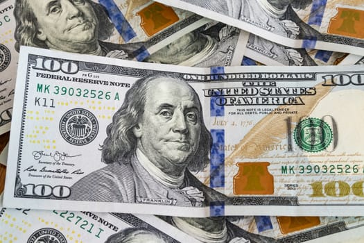 close up US dollar banknotes on background.
