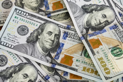 close up US dollar banknotes on background.