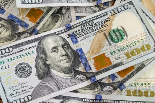 close up US dollar banknotes on background.