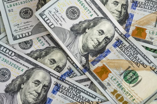 close up US dollar banknotes on background.