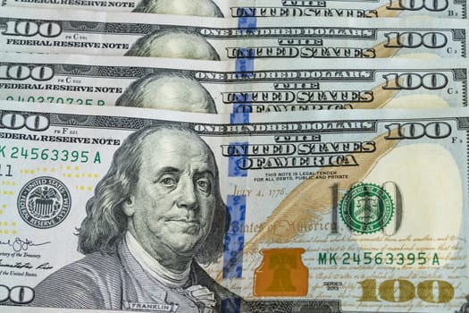 close up US dollar banknotes on background.