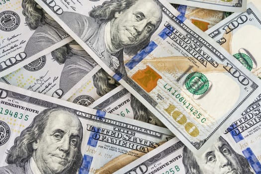 close up US dollar banknotes on background.