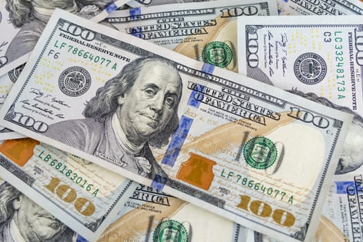 close up US dollar banknotes on background.