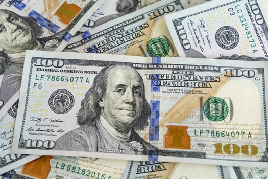 close up US dollar banknotes on background.