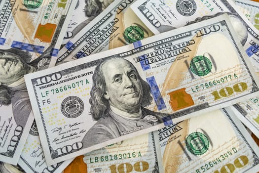 close up US dollar banknotes on background.