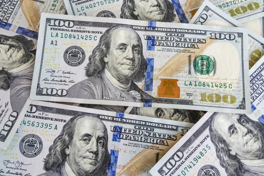 close up US dollar banknotes on background.