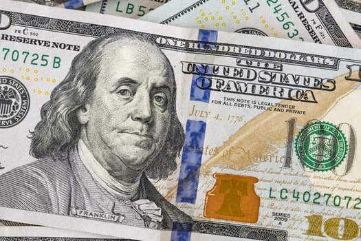 close up US dollar banknotes on background.