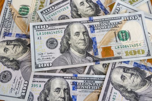 close up US dollar banknotes on background.