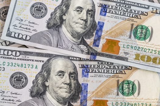 close up US dollar banknotes on background.