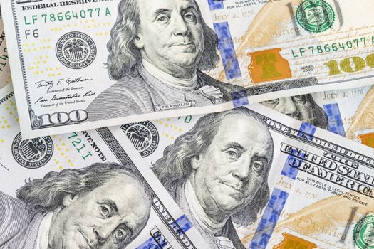 close up US dollar banknotes on background.