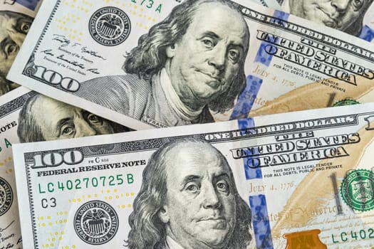 close up US dollar banknotes on background.
