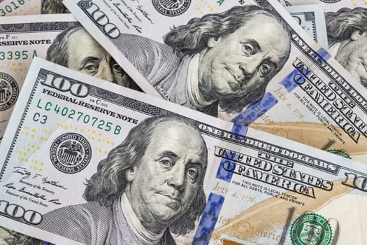 close up US dollar banknotes on background.