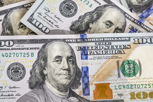 close up US dollar banknotes on background.