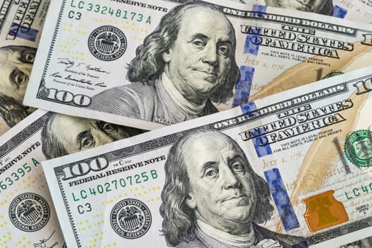 close up US dollar banknotes on background.