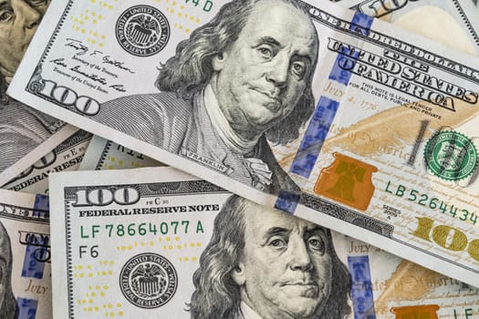 close up US dollar banknotes on background.