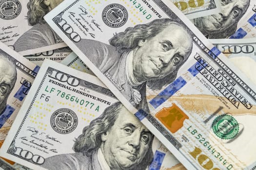 close up US dollar banknotes on background.