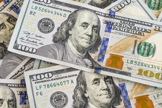 close up US dollar banknotes on background.