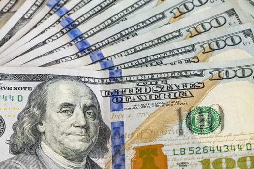 close up US dollar banknotes on background.