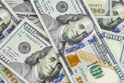 close up US dollar banknotes on background.