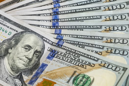close up US dollar banknotes on background.