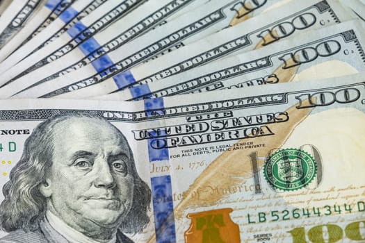 close up US dollar banknotes on background.