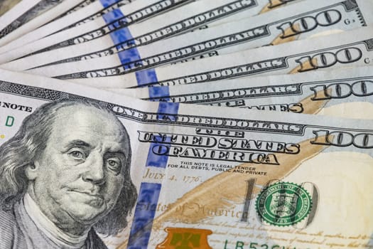 close up US dollar banknotes on background.