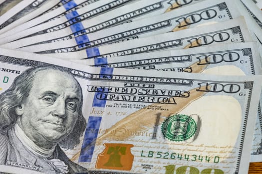 close up US dollar banknotes on background.
