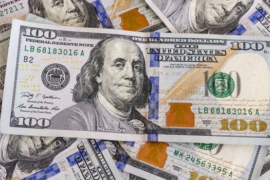 close up US dollar banknotes on background.