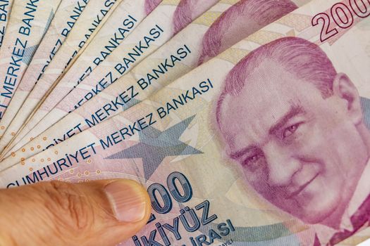 close up turkish lira banknotes on background