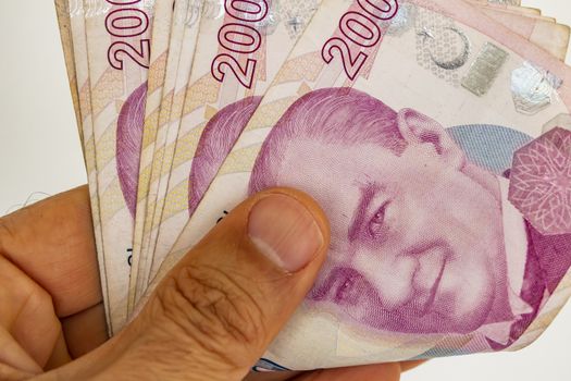 close up turkish lira banknotes on background