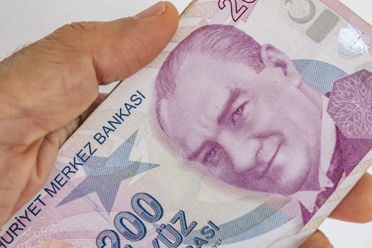 close up turkish lira banknotes on background