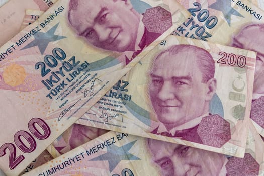 close up turkish lira banknotes on background