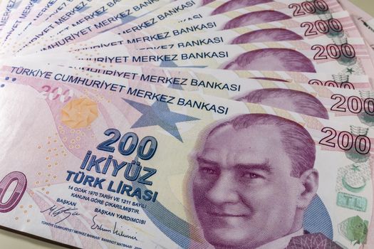 close up turkish lira banknotes on background