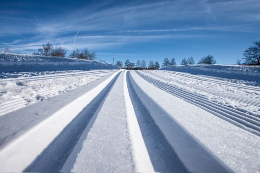 cross country tracks in snow on Zugerbeg switzerland. Clean tracks in Snow