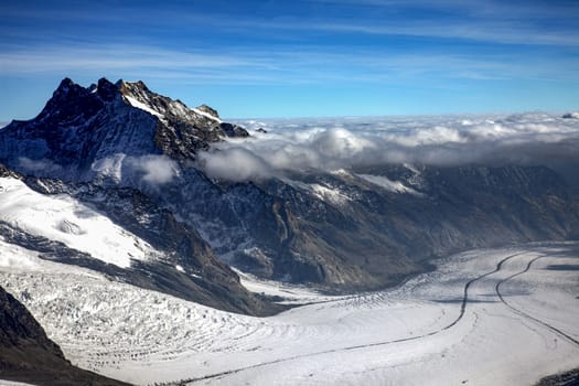 Three famous Swiss mountain peaks, Eiger, Mönch and Jungfrau, With clouds and snow